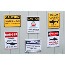 Load image into Gallery viewer, Decorate your Jaws Party with these fun shark decorative signs. You will receive a PDF file formatted 8 ½ X 11inches with 8 different Shark Warning Signs. Two of the signs can be edited with your child&#39;s name. 